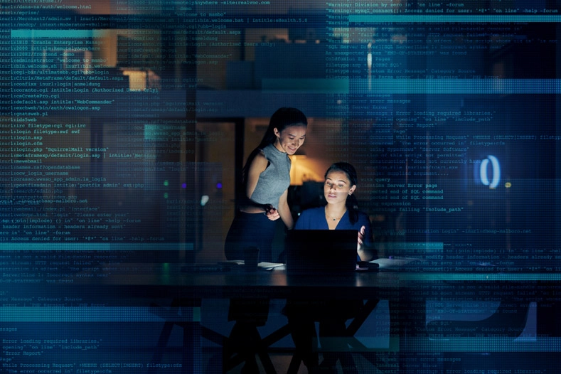 Aperio_global_homepage-women-at-computer-coding